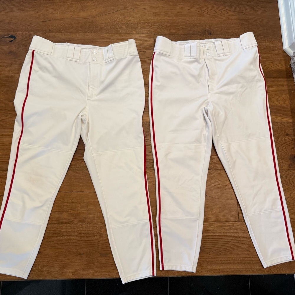 New Mizuno Adult White baseball Pants with Red Stripe. $25 each